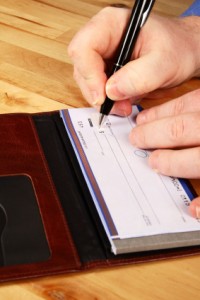 writing a check on tenant screening blog